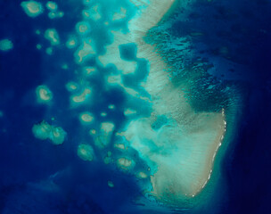 Satellite view of Palau, Micronesia, north island of Kayangel island, uninhabited atoll. Crystalline, transparent and limpid seabed. Tropical islands. Element of this image is furnished by Nasa