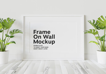 White Frame Mockup Leaning on Wall