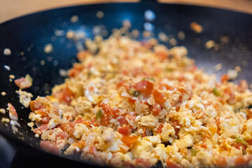 Delicious Mexican-style scrambled eggs in a frying pan
