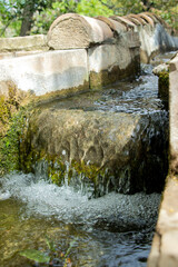 Fototapeta na wymiar Canal de Agua en Carmen de los Martires Zona de dentro Granada Ciudad en España