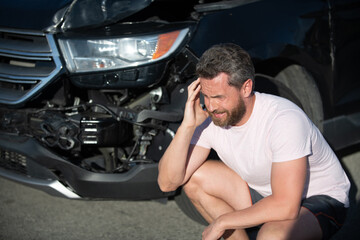 Naklejka na ściany i meble man with auto broken on road. car insurance. automobile crash. vehicle collision.