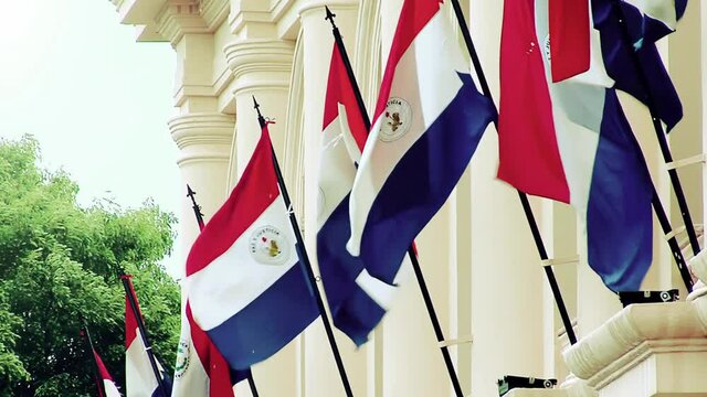 Flags of Paraguay at the Town Council Building (Cabildo) in Asuncion, Paraguay. 4K Resolution.
