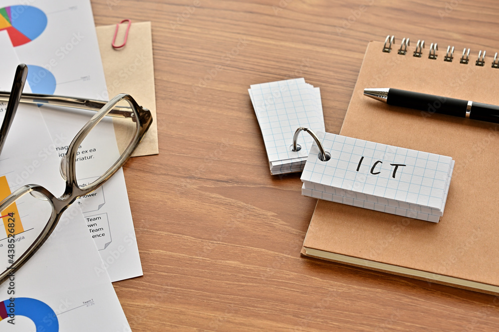 Aufkleber there is a word book with the word of ict which is an abbreviation for information and communication