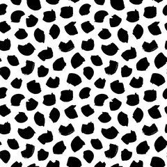 Simple and small black dots seamless pattern. Random scattered blots, abstract black and white background. Freehand drawing vector polka dots. Print, wrapping paper, wallpaper, textile design.