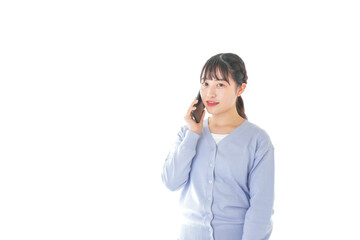 スマホを使う若い女子学生