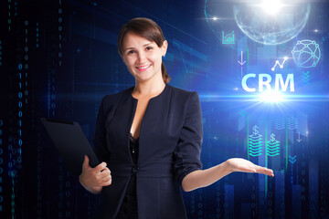 Business, Technology, Internet and network concept. Young businessman working on a virtual screen of the future and sees the inscription: CRM
