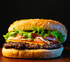 Homemade burger with black background