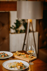 Chicken parmigiana. Traditional Italian comfort dish. Chicken breast covered in breadcrumbs fried, topped with marinara sauce, melted mozzarella, parmigiana and provolone cheeses and Italian parsley.