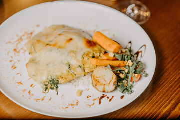 Chicken parmigiana. Traditional Italian comfort dish. Chicken breast covered in breadcrumbs fried,...