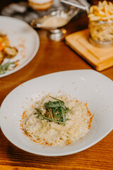 Chicken parmigiana. Traditional Italian comfort dish. Chicken breast covered in breadcrumbs fried, topped with marinara sauce, melted mozzarella, parmigiana and provolone cheeses and Italian parsley.