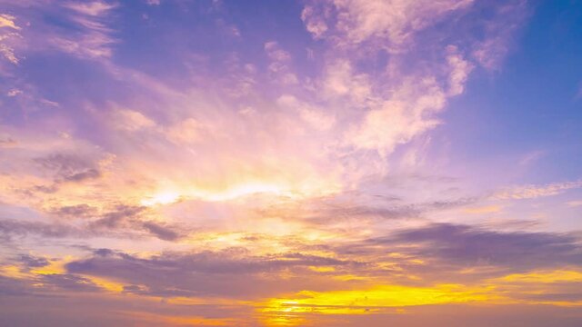 4K Time lapse of Majestic sunset or sunrise landscape Amazing light of nature cloudscape sky and Clouds moving away rolling 4k colorful dark sunset clouds Footage timelapse Beautiful light of nature