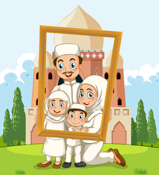 Happy family holding photo frame with mosque on the background
