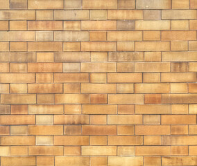 Brickwork of brick wall in Flemish Bond. This design has one stretcher between headers with the headers centred over the stretchers in the courses below.