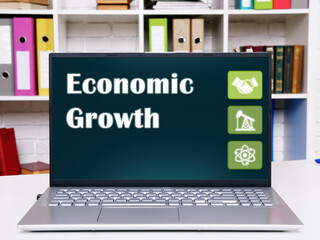 Financial concept meaning Economic Growth with inscription on the screen.