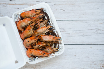 Delicious grilled shrimp in foam box package. Thai cuisine seafood
