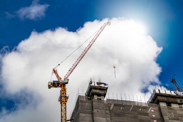 tower crane at construction site with shine.