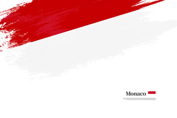 Happy national day of Monaco with grungy stylish brush flag background