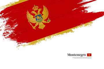 Happy independence day of Montenegro with grungy stylish brush flag background - obrazy, fototapety, plakaty