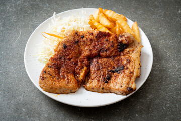 grilled spicy barbecue pork steak with french fries