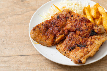 grilled spicy barbecue pork steak with french fries