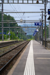 Empty platform at railway station Eglisau, canton Zurich, at summertime. Photo taken June 9th, 2021, Eglisau, Switzerland.