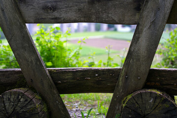 Empty wooden bench at Eglisau, Canton Zurich, with beautiful view over the village and the river Rhein (Rhine). Photo taken June 9th, 2021, Eglisau, Switzerland.