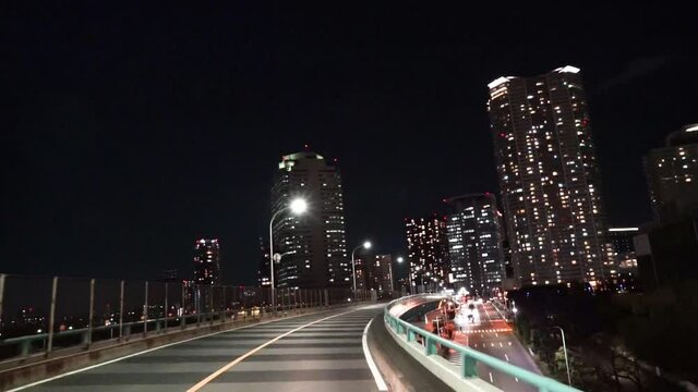 東京ドライブ車窓　湾岸　豊洲　晴海通りから高層マンション群に向かう　夜景