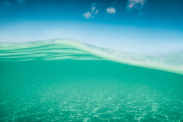 Sea sand and blue water. Underwater. ocean background