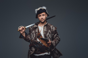 Naklejka premium Medieval corsair pirate with saber and pistol