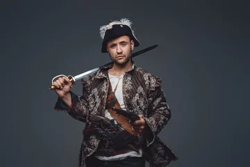 Fotobehang Medieval corsair pirate with saber and pistol © Fxquadro