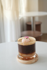 Espresso coffee mixed with lychee juice on the table. Various fruits mixed with coffee, good taste, fragrant, mellow, giving a fresh feeling Healthy drink concept