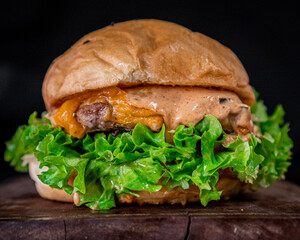 Tasty classic hamburger served on a slab