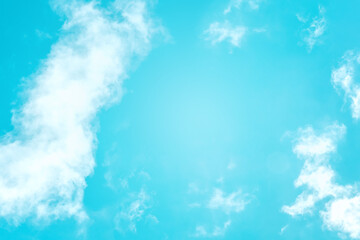 Bright blue sky with white clouds, abstract background with a place for text