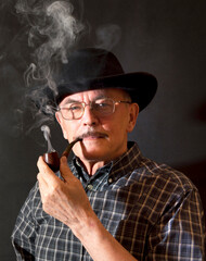 Cowboy in hat with Pipe