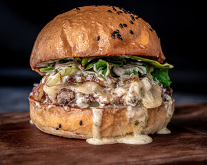 Great blue cheese burger served on a slab