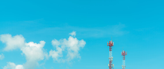 Telecommunication tower with blue sky and white clouds. Radio and satellite pole. Communication technology. Telecommunication industry. Mobile or telecom 4g and 5g network. Telecommunication pylon. - obrazy, fototapety, plakaty