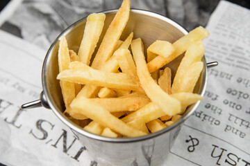 French fries in a metal bucket