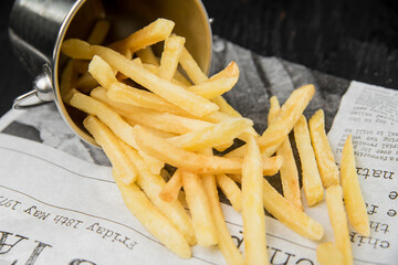 French fries in a metal bucket