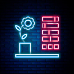 Glowing neon line Flower status icon isolated on brick wall background. Colorful outline concept. Vector
