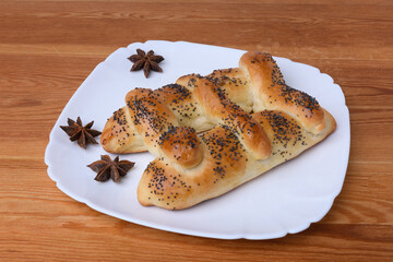 pie in the form of a ladder sprinkled with poppy seeds is baked in Christianity for the feast of the Ascension