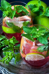 Citrus fruits   lemonade in  glass with  mint leaves