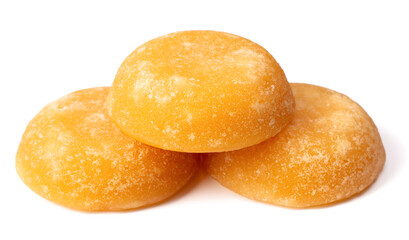 three cakes of palm sugar isolated on white background