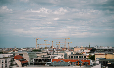 construction site with many cranes in summer