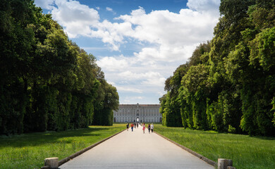 The Royal Palace of Caserta, Italy, June 2021, People walk along the internal avenue of the Palace