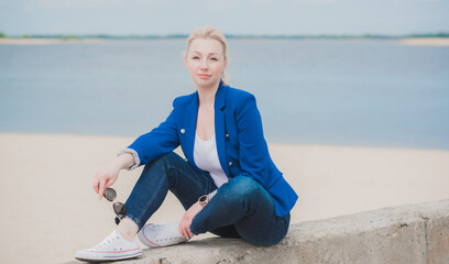 Portrait of modern business lady rest at beach after week work 