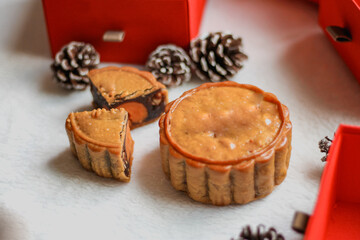 Traditional Moon Cake inside a red box during the Mid-Autumn Festival or Moon cake Festival