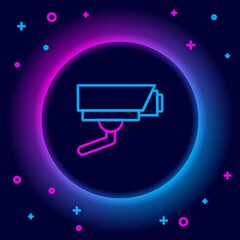 Glowing neon line Security camera icon isolated on black background. Colorful outline concept. Vector