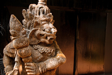 Ornate wooden sculpture display in the famous Baan Dam Museum or Black House in Chiang rai Thailand