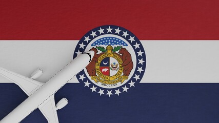 Top Down View of a Plane in the Corner on Top of the US State Flag of Missouri