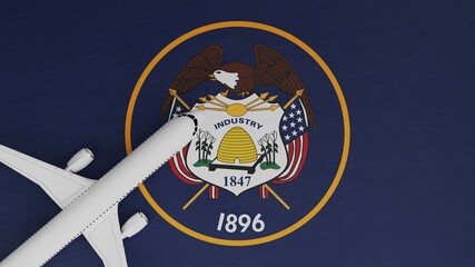 Naklejka premium Top Down View of a Plane in the Corner on Top of the US State Flag of Utah